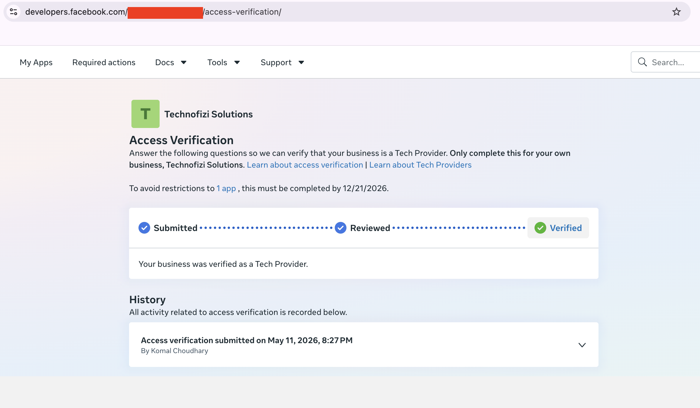Meta access verification screen for Technofizi Solutions showing Submitted, Reviewed, and Verified. The history names team member Komal Choudhary and the submission date May 11, 2026. Part of the dashboard URL is hidden.